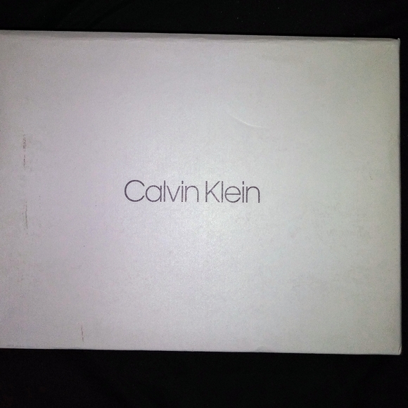 Calvin Klein" Reem 2" Ankle Strap Sandal In White Leather - Picture 12 of 16